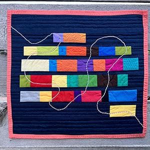 Science Fact, Fiction, Fantasy — textile art by Sara Neal